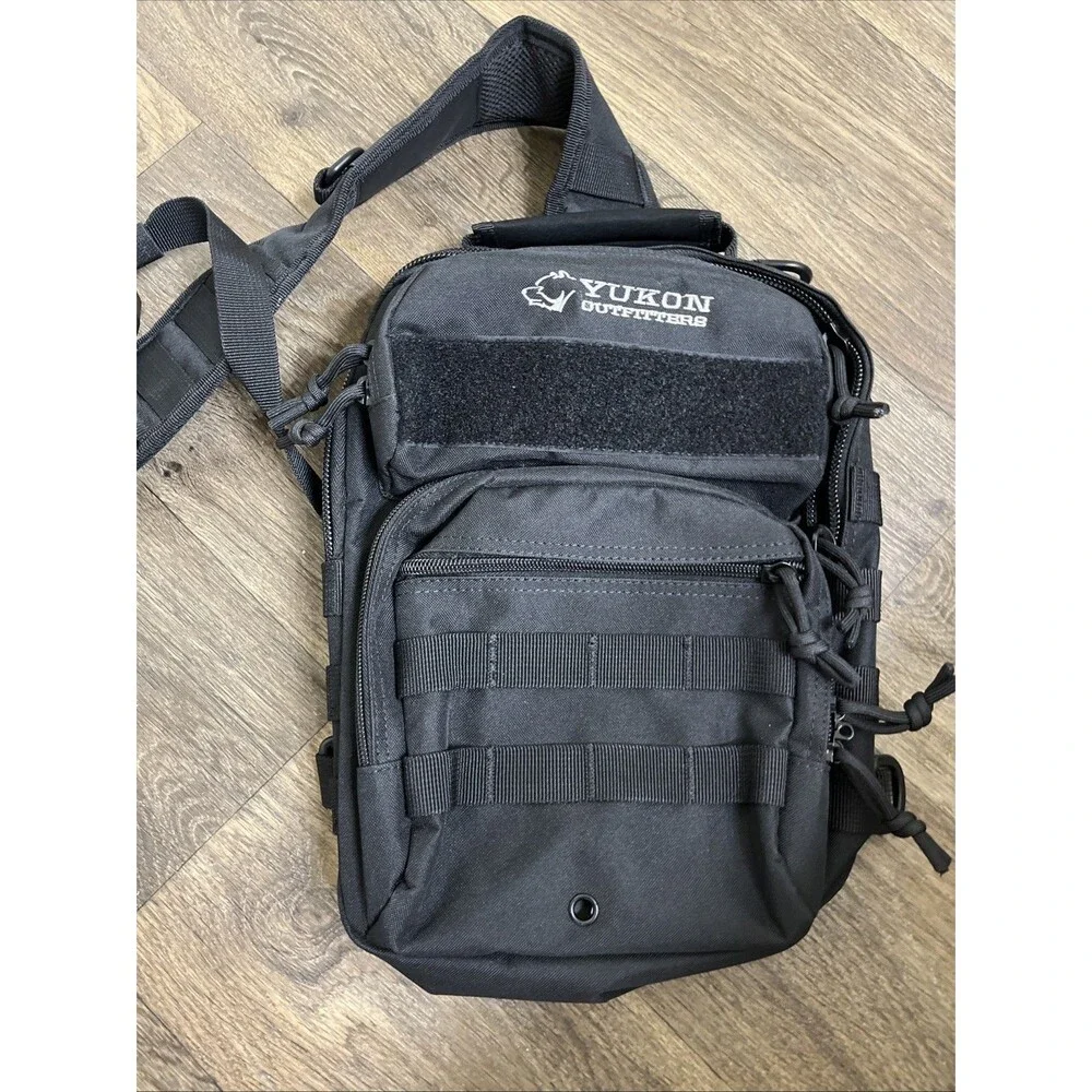 YUKON OUTFITTERS Men's Black Sling Bag (Single Strap) Pockets Backpack